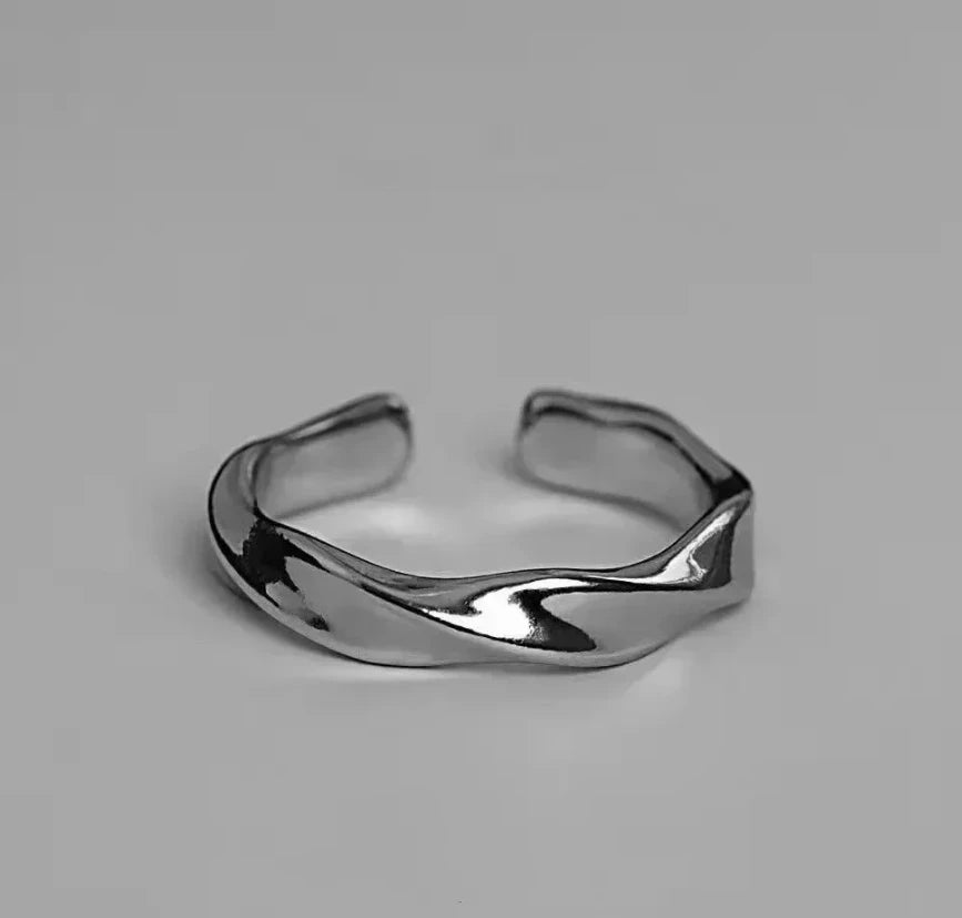 Elegant minimalistic curved Silver Ring