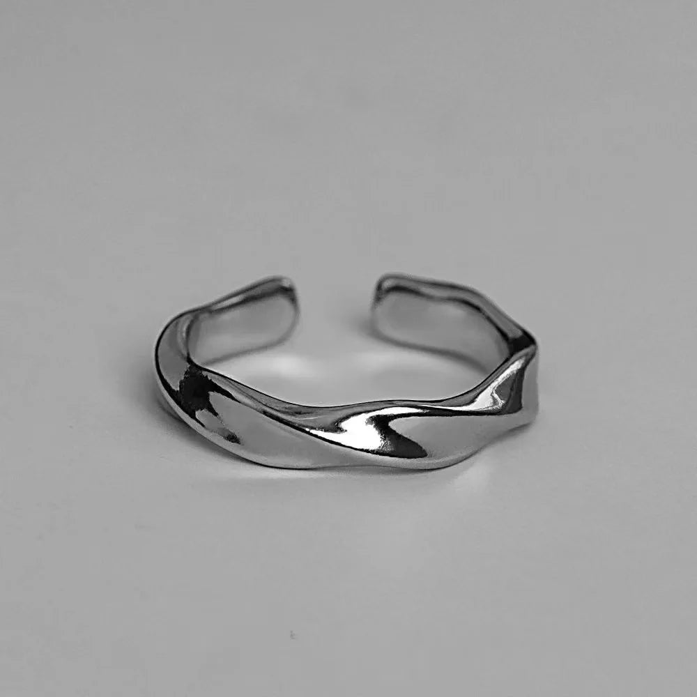 Elegant minimalistic curved Silver Ring
